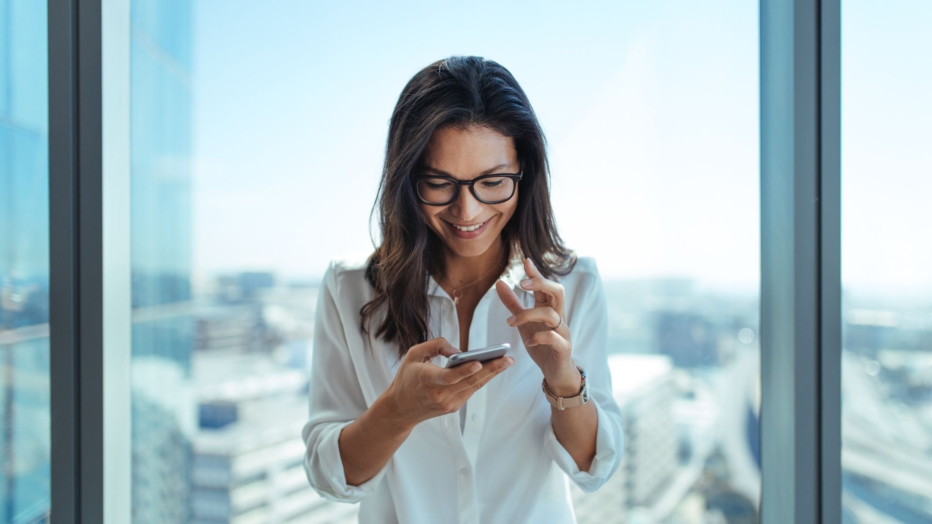 Investor check stocks on phone